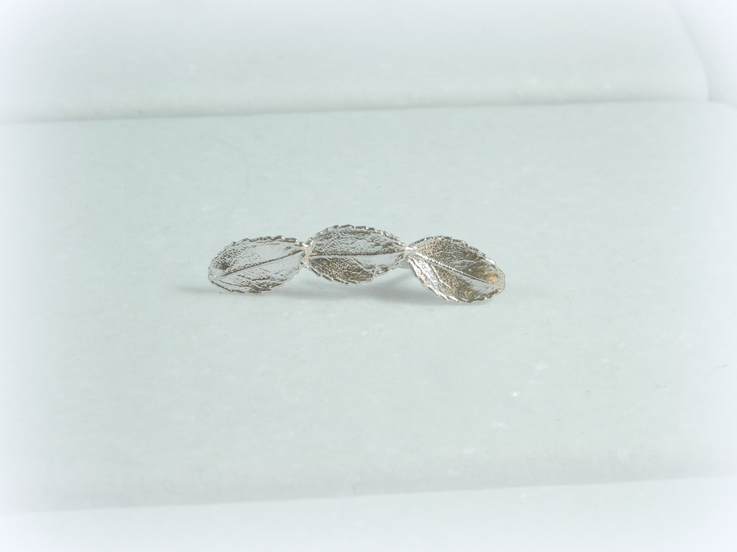 Ear crawler, Mismatched earrings. Real Rose leaf Ear climbers in sterling silver.Roses are ancient symbols of Love and Beauty .
