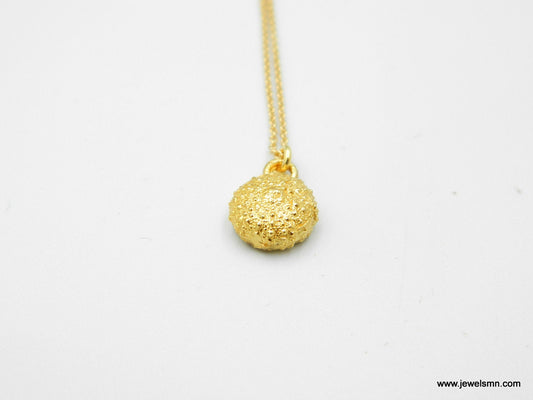 Tiny Urchin pendant necklace,18k Gold plated on sterling silver 925 by Mother Nature.Urchin is a symbol tenacity,Patience and Life Force.