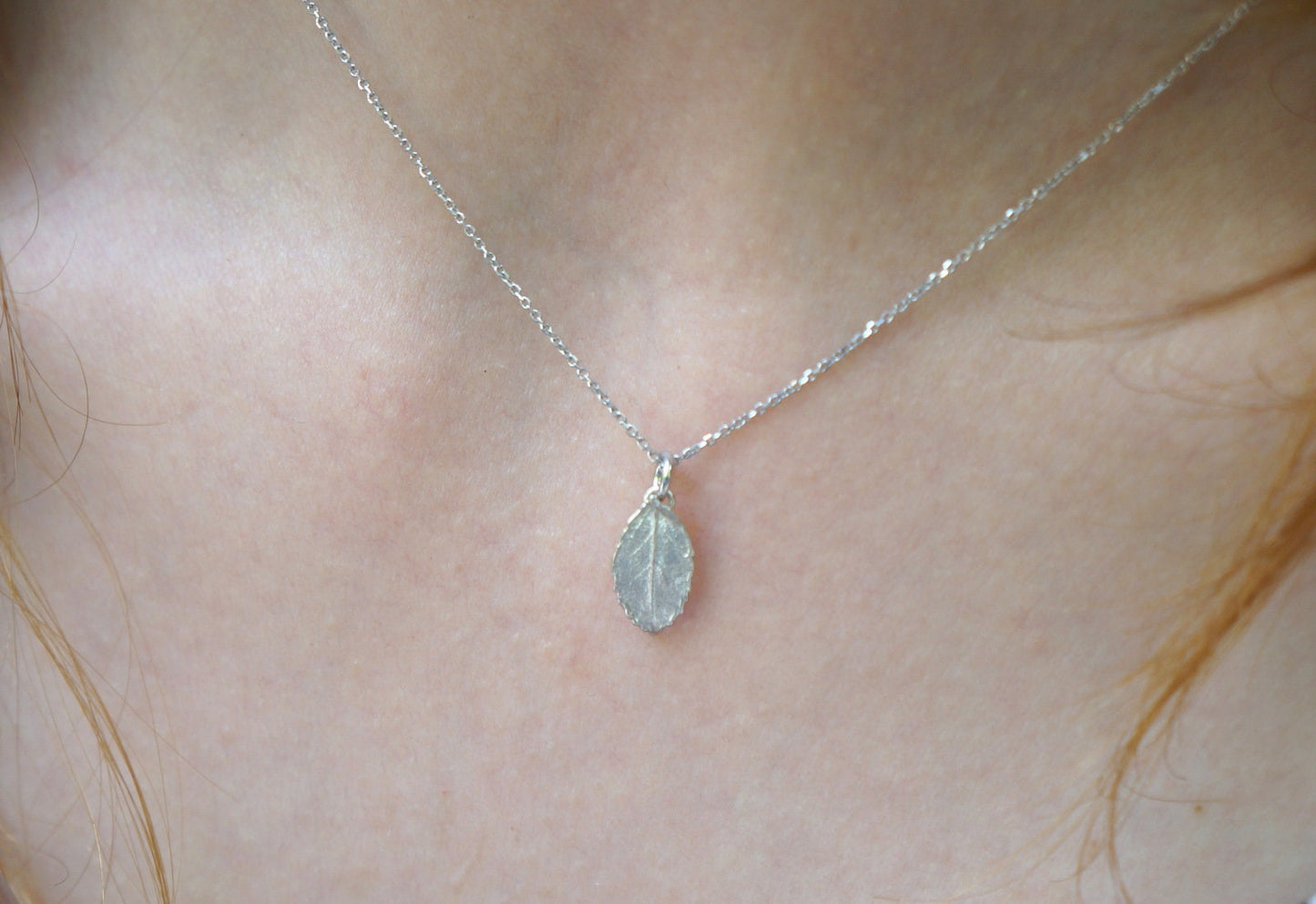Tiny necklace Jewelry. Gold plated Rose leaf Necklace on sterling recycled silver.
