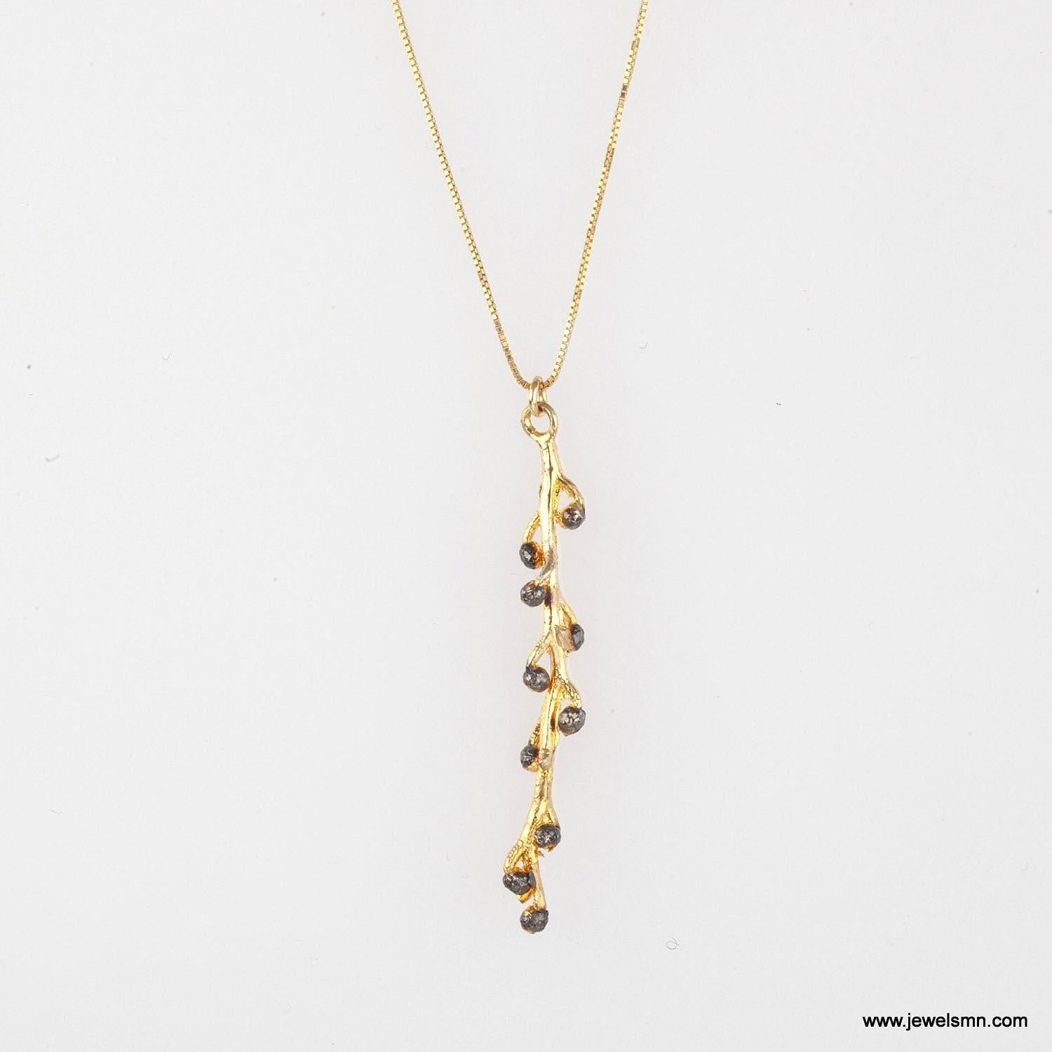 Acacia Branch Necklace: Gold-Plated Brass with Black Rhodium Detail