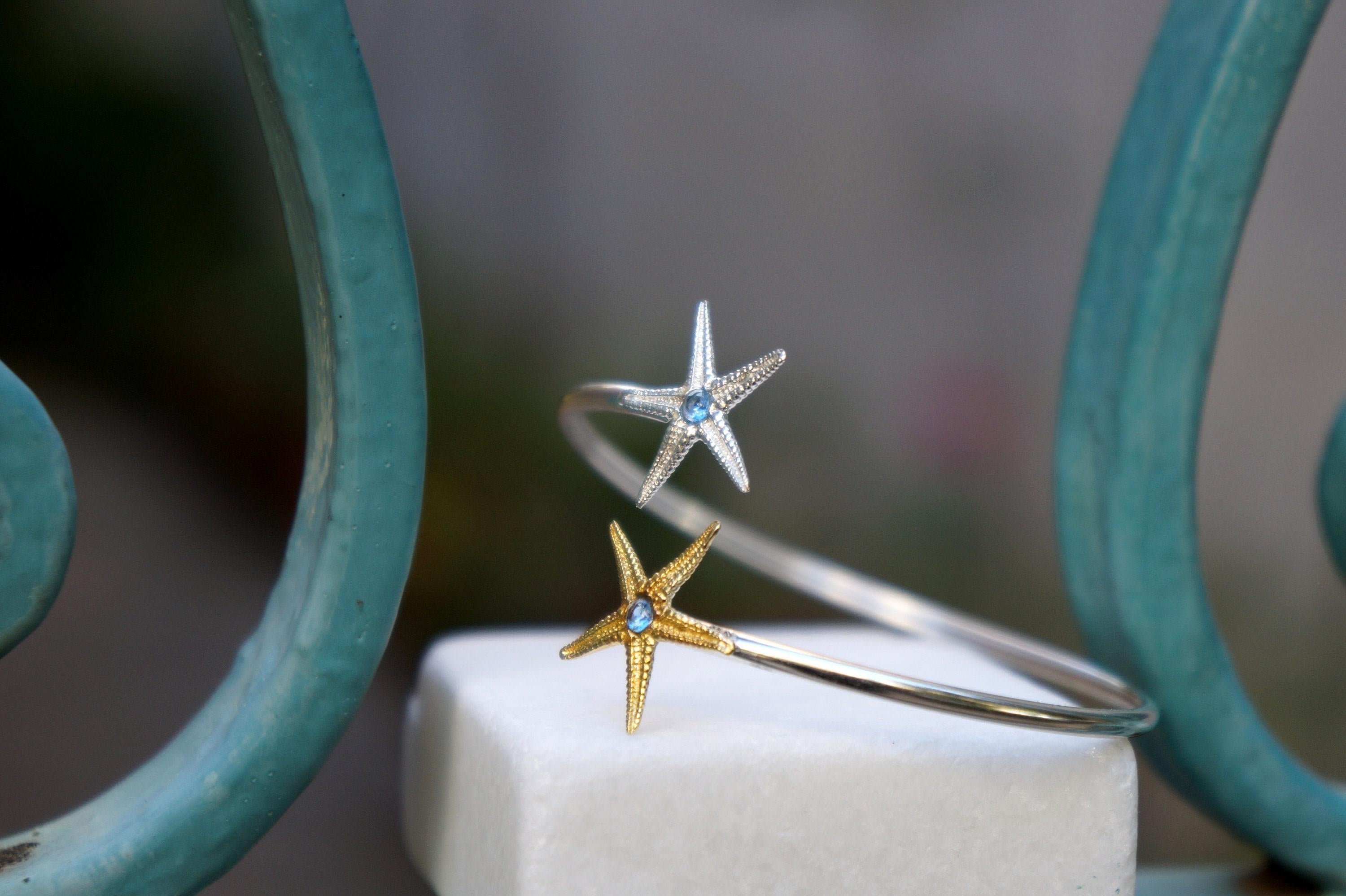 Silver Starfish Bracelet: Adjustable Cuff with Blue Zircon