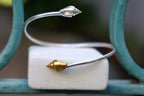 Silver Shell Bracelet: Adjustable Cuff with Gold Details