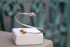 Silver Shell Bracelet: Adjustable Cuff with Gold Details