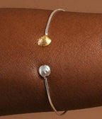 Seashell handmade bracelet.Two tiny clams sterling silver and gold plated. Clams symbolize resurrection, life protection & good fortune