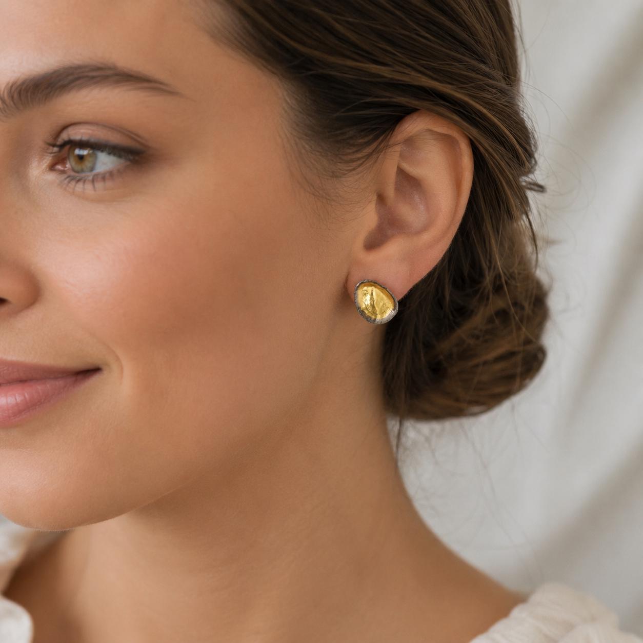 Two-Tone Limpet Stud Earrings - Lightweight design ideal for everyday wear or special occasions.Gold and Black on recycled Brass.